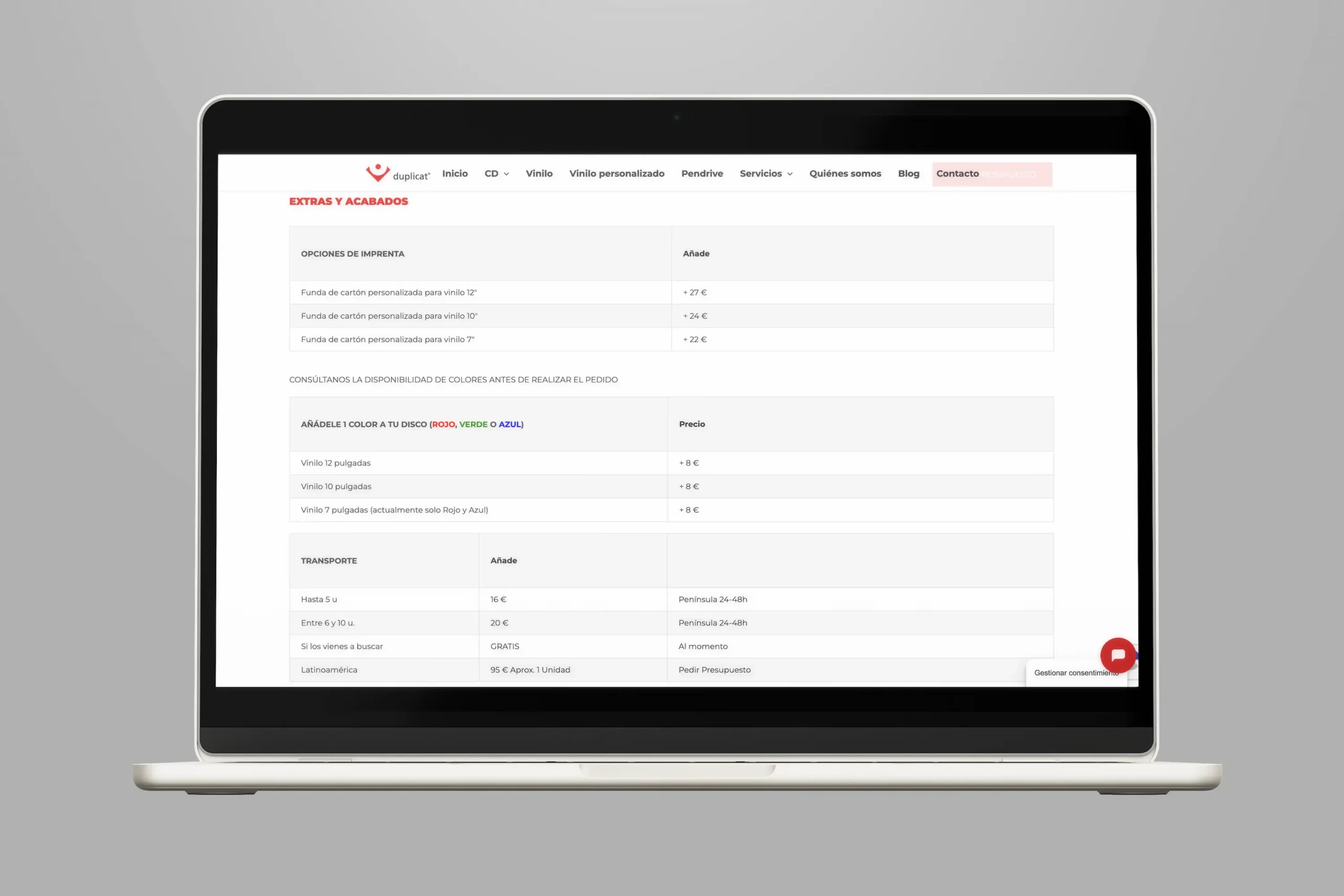 Página web de Duplicat mostrando opciones de imprenta y precios de vinilos en un laptop.